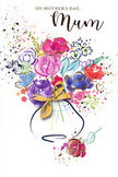 This Mother's Day card radiates joyful energy, presenting a bouquet painted in fluid watercolour and shimmering accents, as though a Harold Hill artist had captured the spirit of a fresh spring arrangement in one spontaneous breath. The flowers themselves appear lush and varied: swirls of purple and violet, bright bursts of fuchsia and rose pink, and lively flashes of red playing across gracefully implied petals. Cooler notes of cornflower blue and gentle lilac are brushed between the warmer tones, tempering the vibrancy and creating a soothing balance that evokes a calm stroll past front gardens and green corners in Harold Hill. Delicate ribbons of gold ink trace select petals and leaves, as well as sparkling specks across the bouquet, catching the light so the composition seems to shimmer softly. The blooms gather into an airy, rounded shape that tapers naturally toward a simple vase at the bottom of the card. This vase is rendered with smooth, curving lines and tied with an elegant golden bow, bringing to mind the feel of a florist's practiced hands finishing a bouquet just before it is delivered to a waiting doorstep. Around the flowers, scattered flecks of colour and tiny abstract marks float like tossed petals or confetti, enhancing the sense of celebration and heartfelt thanks. The overall impression is one of warmth, gratitude, and gentle festivity - a painterly tribute perfectly suited for expressing love to a cherished mum in Harold Hill, whether alongside real blooms or as a keepsake all on its own.